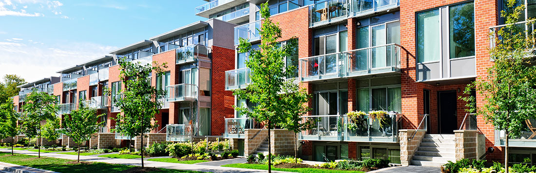 Photo of apartment complex and sky