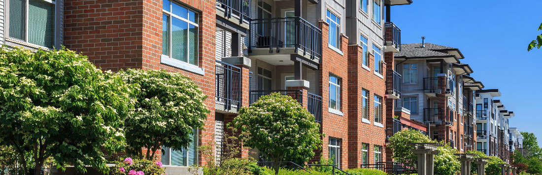 Photo of apartment complex and sky